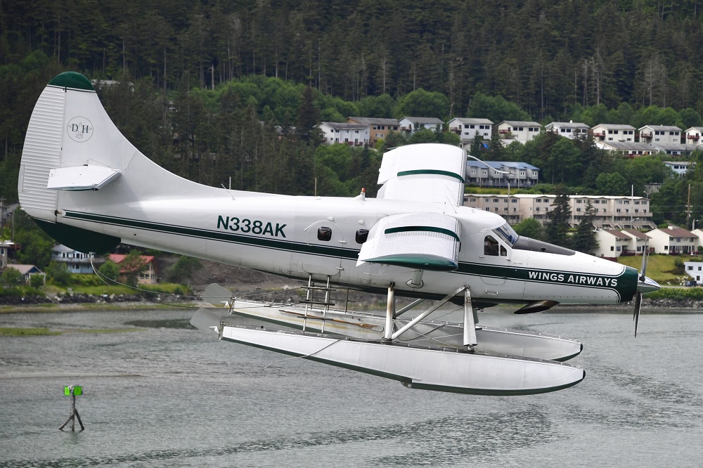 Sun Photo A00030 Wings Airways float plane loanding in Juneau Alaska